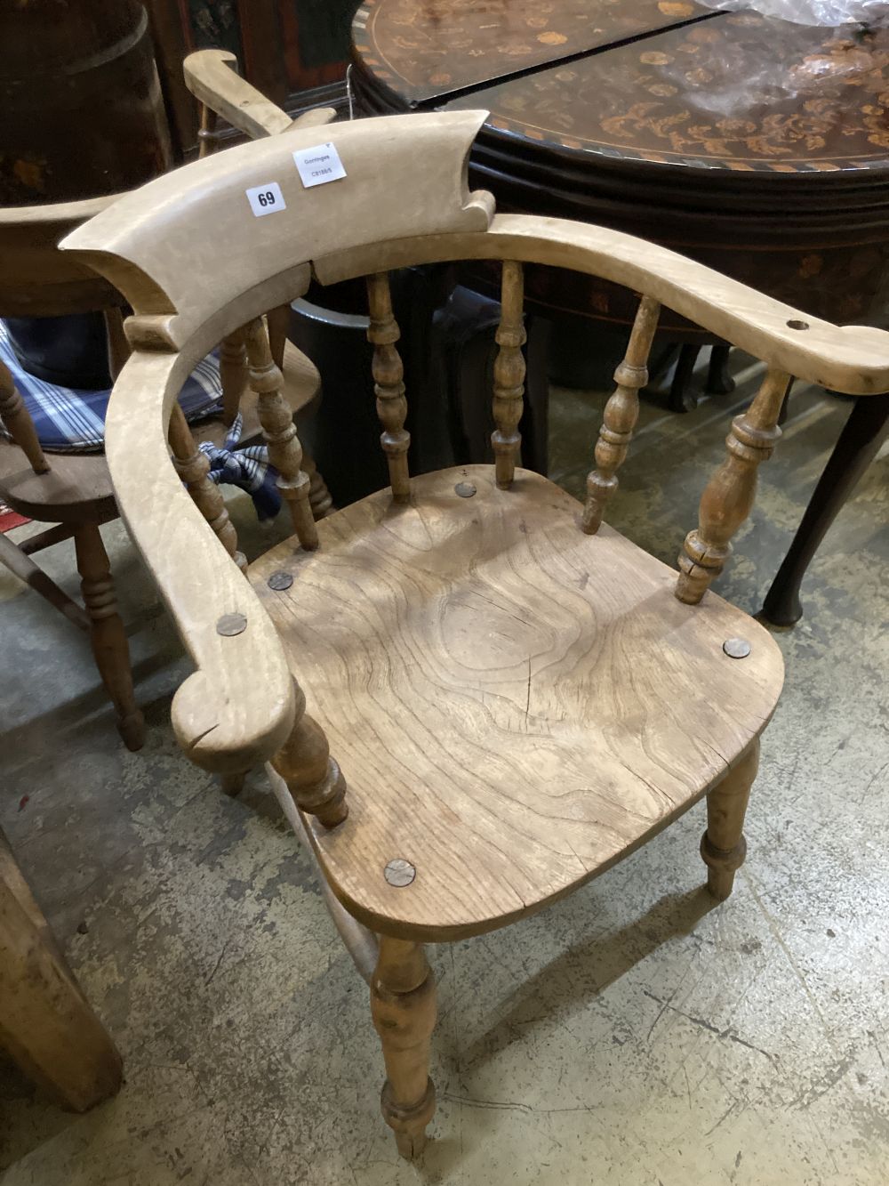 Two Victorian elm and beech smokers bow elbow chairs together with six Windsor kitchen chairs